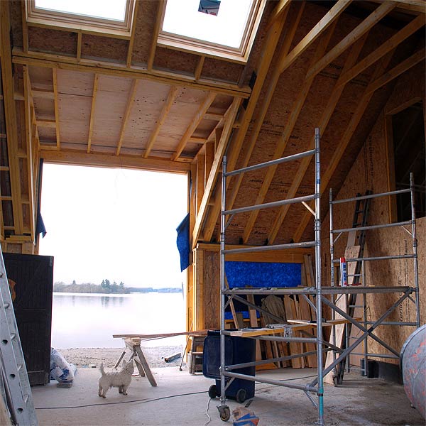 View of the sheltered communal space with its 'cathedral ceiling and views out over the water.  January '13 - about half finished